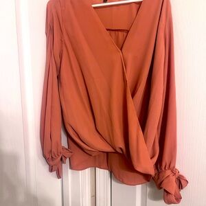 Beautiful bow sleeve detail blouse